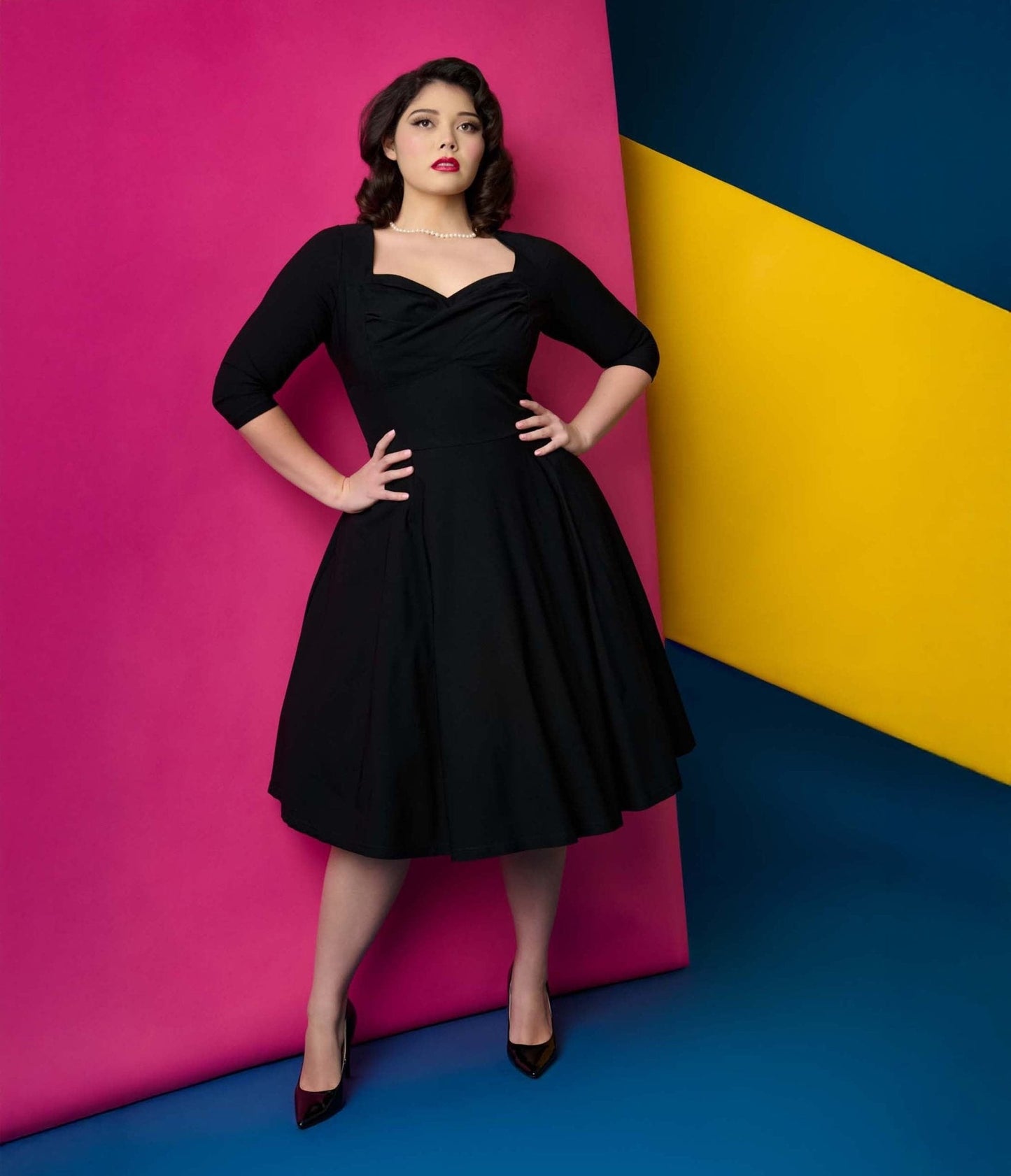 Unique Vintage Plus Size 1950s Black Pleated Bust Swing Dress