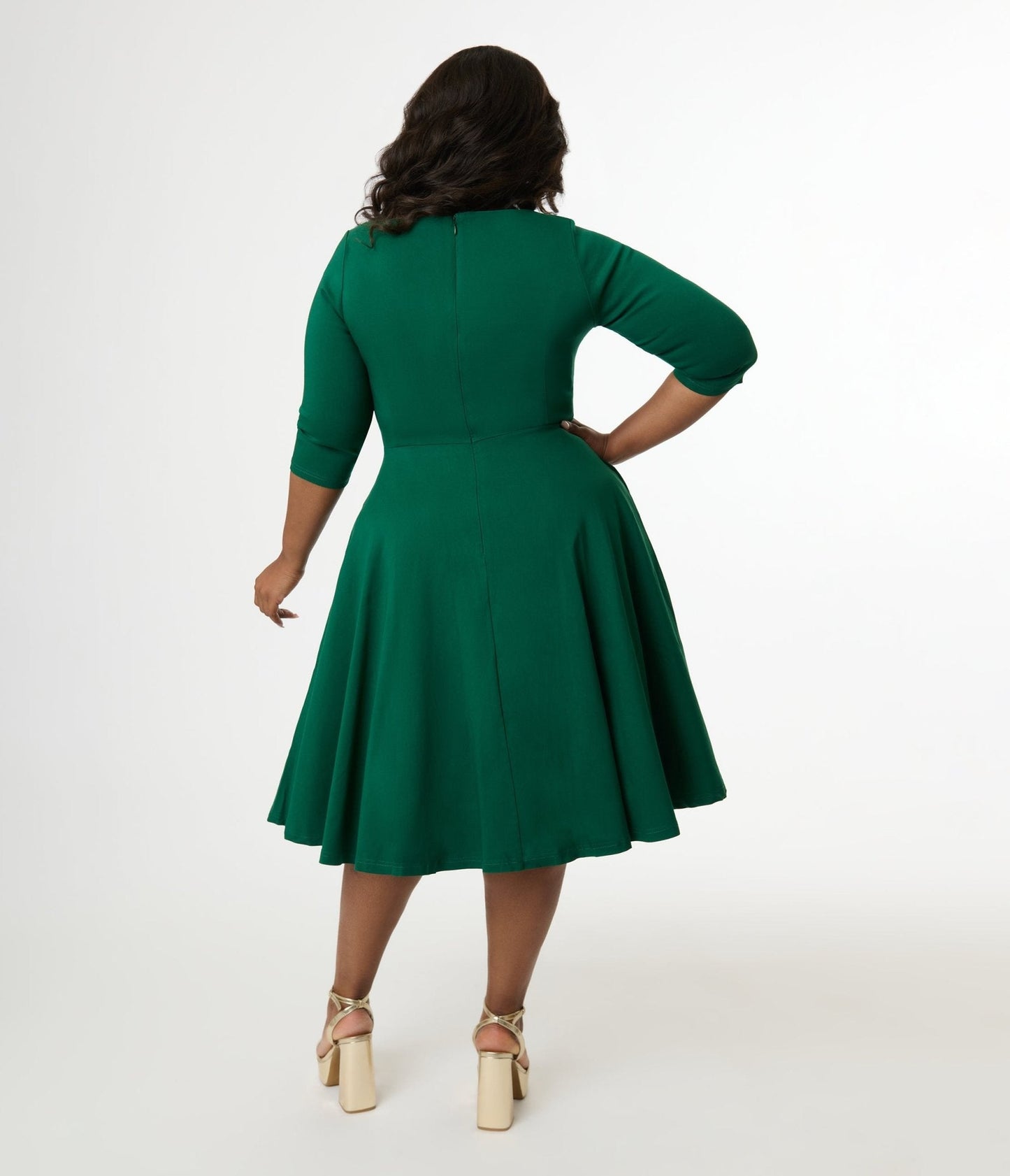 Unique Vintage Plus Size 1950s Emerald Green Pleated Bust Swing Dress