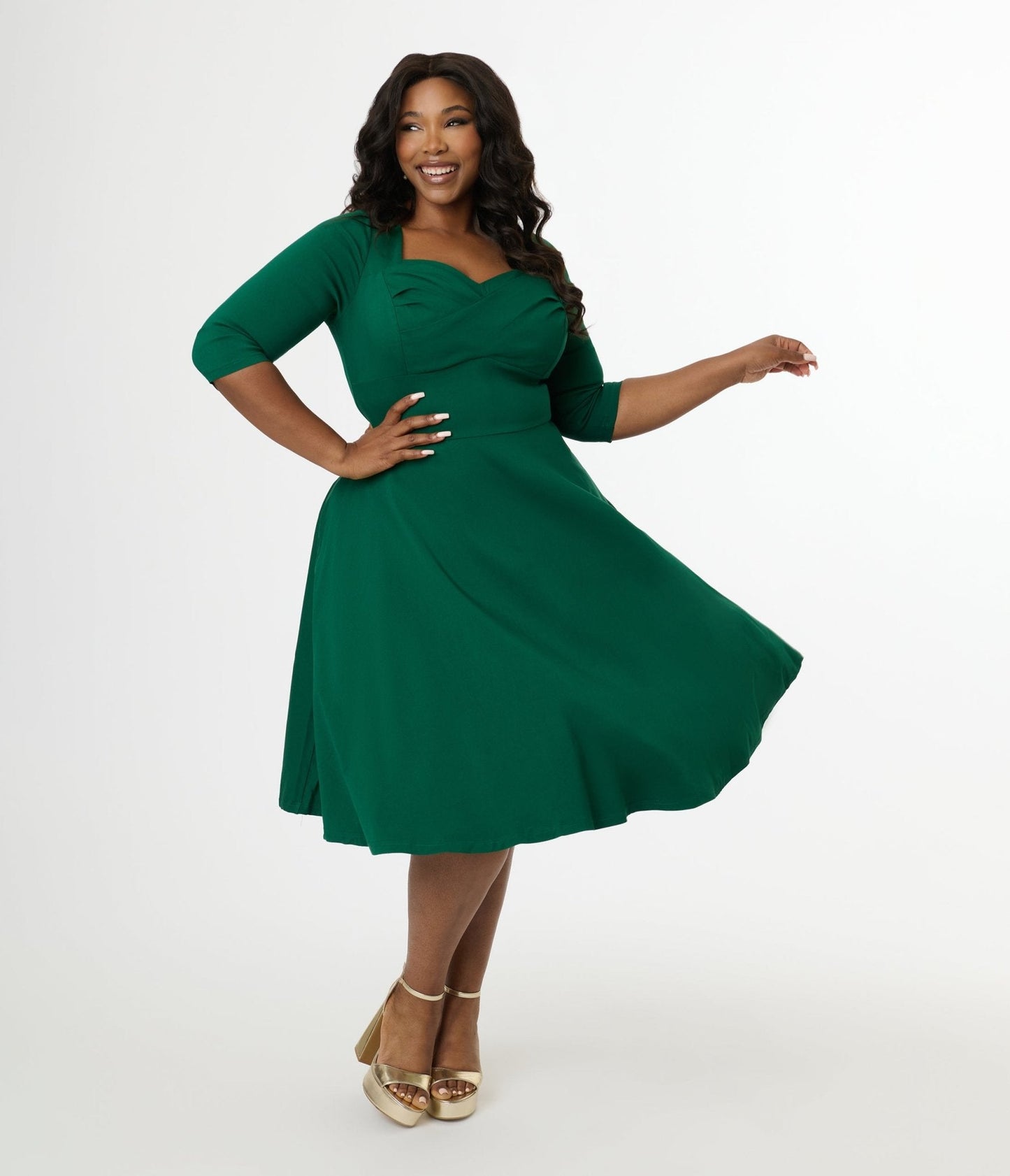 Unique Vintage Plus Size 1950s Emerald Green Pleated Bust Swing Dress